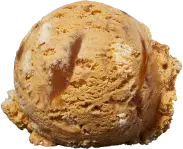 A single scoop of caramel ice cream with swirls of caramel sauce.